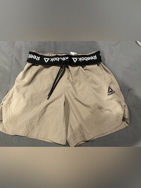 Reebok woman’s Khaki Athletic Shorts with Black Shirt